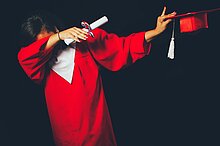 Promotion Person wearing red graduation dress
