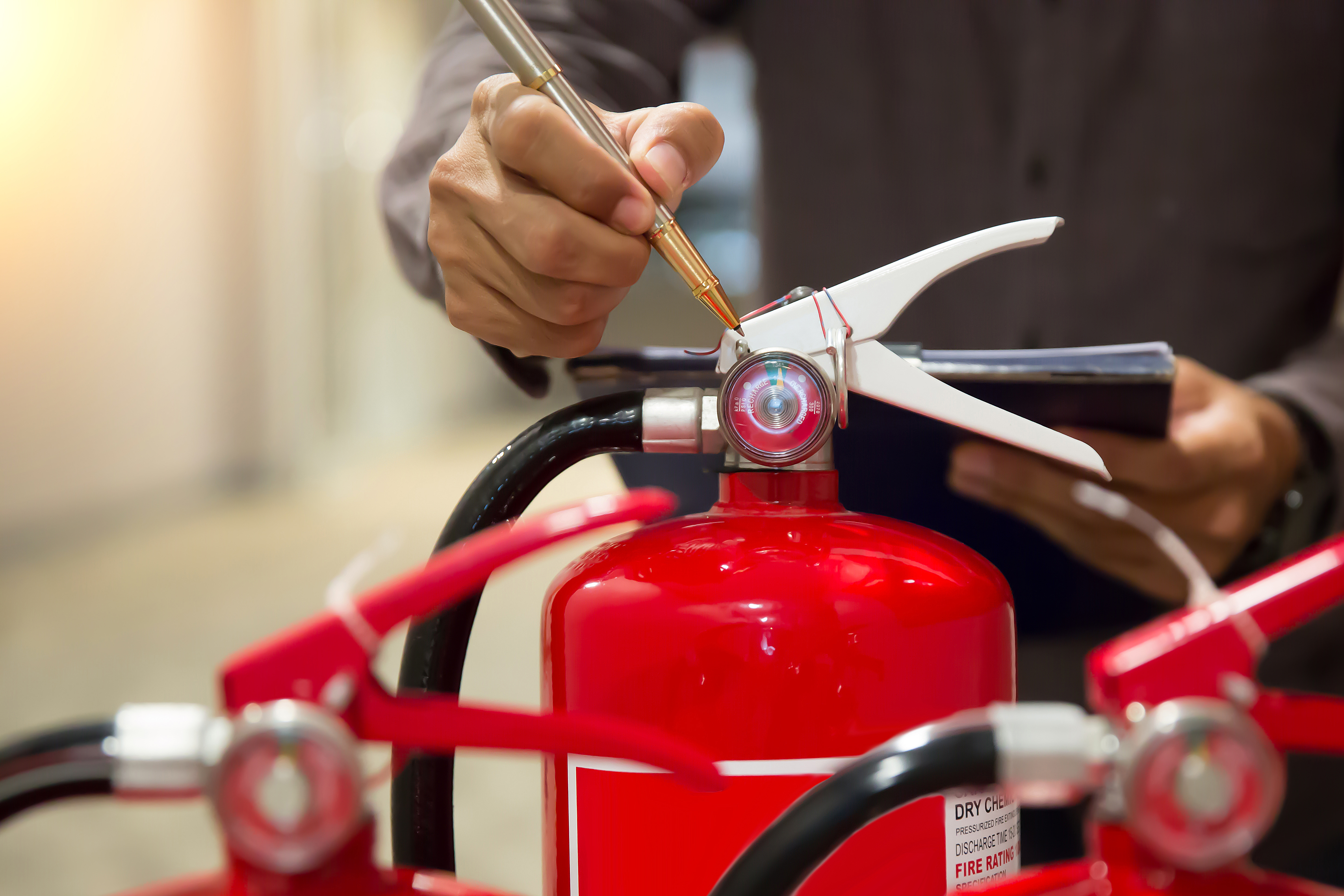 Fire extinguishers, Engineers are checking fire extinguishers.